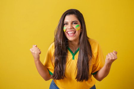 Foto de Brasil mujer partidaria, 2022 Copa del Mundo, campeonato de fútbol, Vibración victoria del equipo - Imagen libre de derechos