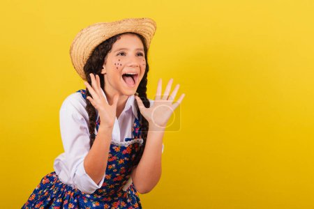 Photo for Girl wearing typical clothes for Festa Junina. surprised, wow, incredible, unbelievable. For the Festival do Arraia - Royalty Free Image