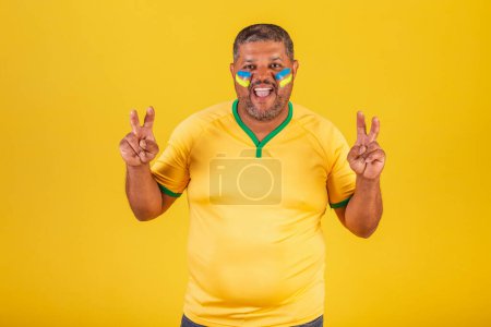 Photo for Brazilian black man, soccer fan from Brazil. peace and love, godvibes. - Royalty Free Image