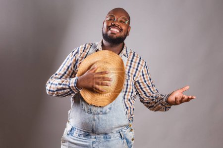 Photo for Brazilian black man wearing country clothes - Royalty Free Image