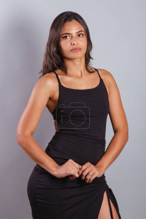 Photo for Beautiful Brazilian woman in black dress, photoshoot. - Royalty Free Image