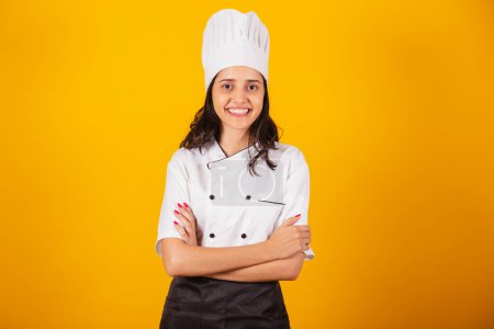 Photo for Brazilian woman, head chef, cook, with arms crossed. - Royalty Free Image