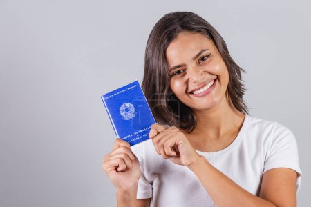 Brazilian woman, holding work card, Brazilian document for form work, human resources.