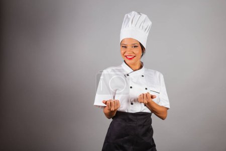 Téléchargez les photos : Chef, cuisinière brésilienne, du Nord-Est, invitant de ses mains, venez ici, bienvenue. - en image libre de droit