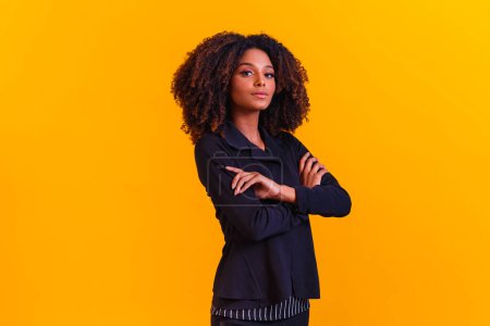 Photo for Afro woman in pantsuit. Successful black woman, business woman. - Royalty Free Image