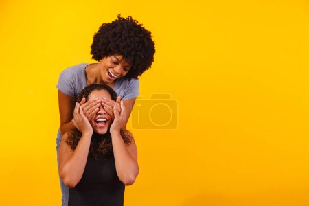 Photo for Portrait of content couple in basic clothing smiling at camera - Royalty Free Image
