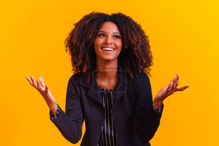 Photo for Happy afro woman with open arms with space for text - Royalty Free Image