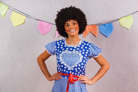 Brazilian afro woman wearing typical clothes for the Festa Junina