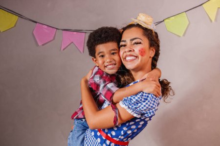Photo for Afro mother and son dressed for June party - Royalty Free Image
