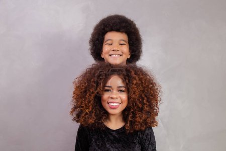 Photo for Mother and son with black power style hair. - Royalty Free Image