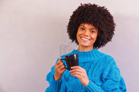 Photo for Afro woman dressed for winter - Royalty Free Image