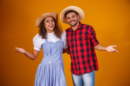 Photo for Brazilian couple wearing traditional clothes for Festa Junina - June festival - Royalty Free Image