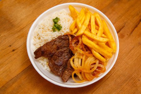 Photo for Rice, beans, french fries and beef steak - Royalty Free Image
