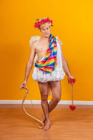Photo for Cupid holding lgbt flag. gay cupid concept - Royalty Free Image