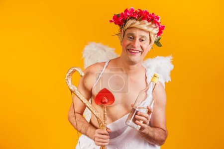 Photo for Drunk cupid holding a bottle of liquor - Royalty Free Image