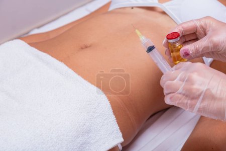 Photo for Mesotherapy treatment on marked woman's body - Royalty Free Image