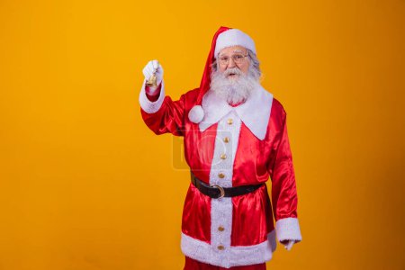 Téléchargez les photos : Le Père Noël sonne une petite cloche. Jingle Bells. Économies sur les achats. Noël arrive. Je me prépare pour la nuit de Noël. Promotion des ventes. - en image libre de droit
