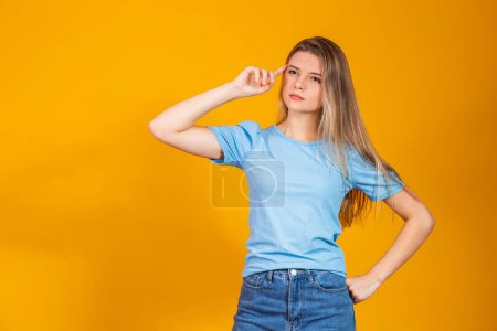 Photo for Young caucasian woman over isolated yellow background thinking and looking to the side - Royalty Free Image