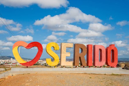 Photo for Serido, Rio Grande do Norte, Brazil - March 12 2021:  I Love Serido message in Portuguese  on Brazil with people - Royalty Free Image