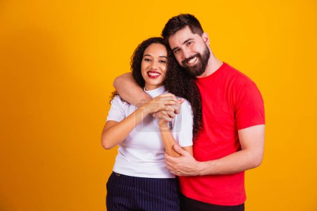 Photo for In love valentine couple on yellow background. Valentine's Day - Royalty Free Image