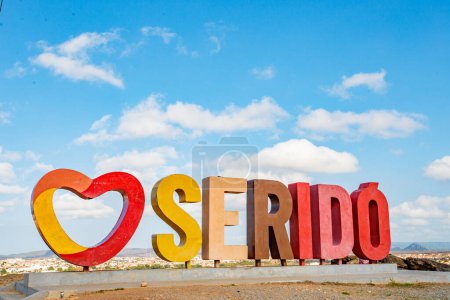 Photo for Serido, Rio Grande do Norte, Brazil - March 12 2021:  I Love Serido message in Portuguese  on Brazil with people - Royalty Free Image