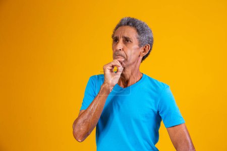 Photo for Pensive elderly afro man trying to remember something - Royalty Free Image