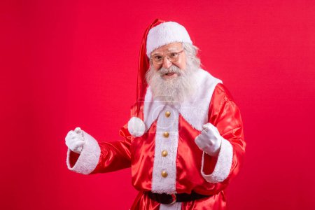 Téléchargez les photos : Le vrai Père Noël fait un geste gagnant. Oui. - en image libre de droit