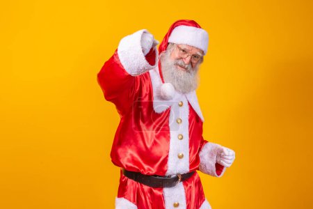Téléchargez les photos : Le vrai Père Noël fait un geste gagnant. Oui. - en image libre de droit
