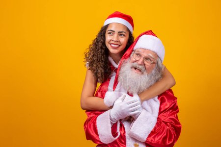 Photo for Santa Claus and noelete in a happy Christmas atmosphere. Merry Christmas - Royalty Free Image