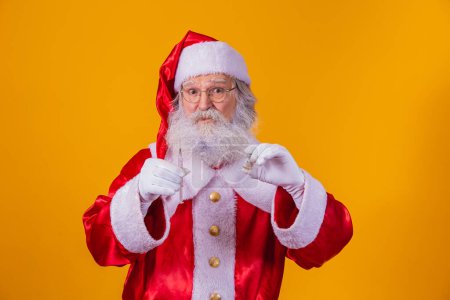 Photo for Santa Claus with syringe and vaccine in hand. Santa Claus holding the covid vaccine - Royalty Free Image