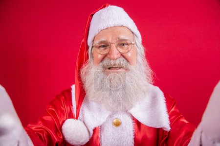 Photo for Santa Claus making selfie photos. Christmas night. Gift delivery. Enchanted dreams of children. - Royalty Free Image