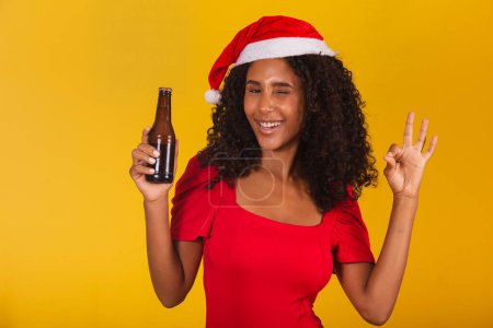 Photo for Afro woman with beer bottle - Royalty Free Image