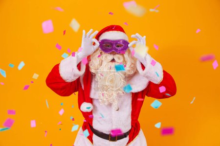 Photo for Beautiful santa claus dressed for carnival night. - Royalty Free Image