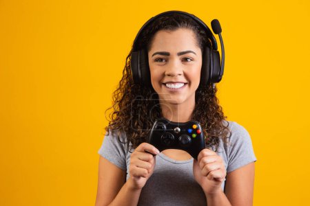 Photo for Excited woman with headset and video game controller. gamer concept - Royalty Free Image