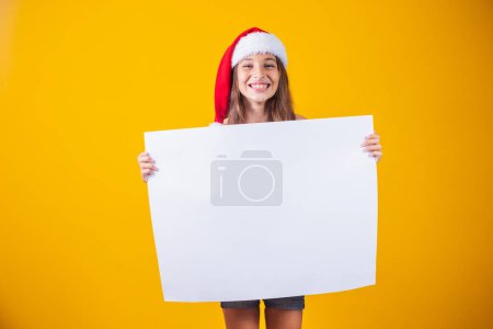 happy little girl at Christmas with a blank empty white poster Poster 655795758