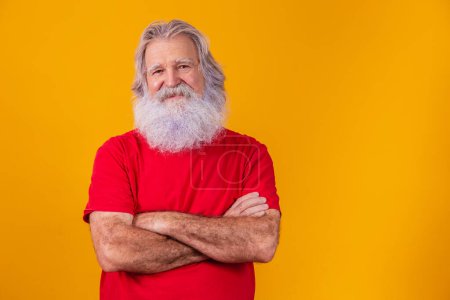 Photo for Old man with long beard with arms crossed looking at the camera - Royalty Free Image