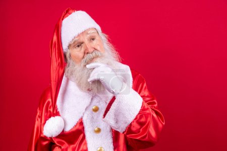 Photo for Thoughtful Santa Claus on red background. real Santa thinking - Royalty Free Image