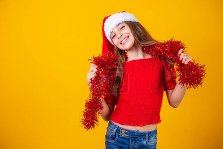 Photo for Cute little girl dressed for christmas night - Royalty Free Image