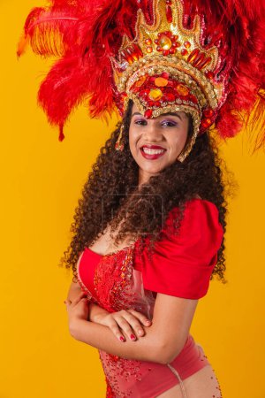 Photo for Beautiful young afro woman in carnival costume with arms crossed. - Royalty Free Image