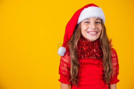 Photo for Cute little girl dressed for christmas night - Royalty Free Image