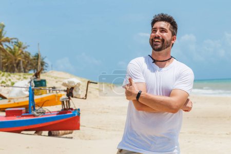 Photo for Beautiful boy on the beach on vacation - Royalty Free Image
