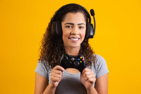 Photo for Excited woman with headset and video game controller. gamer concept - Royalty Free Image