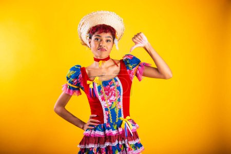Foto de Mujer brasileña con ropa de fiesta junina. Arraial, Fiesta de San Juan. disgusto - Imagen libre de derechos