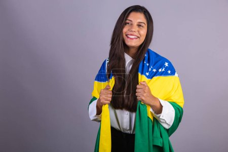 Photo for Brazilian businesswoman, manager, corporate portrait. with brazil flag. - Royalty Free Image