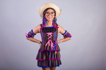 Photo for Brazilian woman with festa junina clothes. celebrating. - Royalty Free Image
