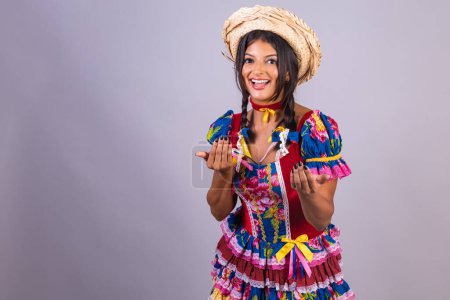 Photo for Brazilian woman with clothes from festa de so joo, festa junina. - Royalty Free Image