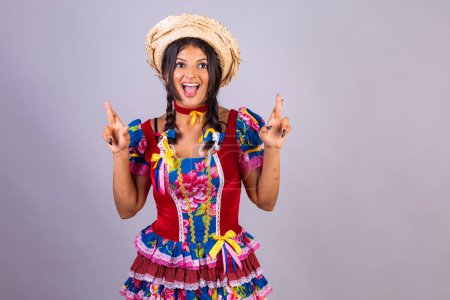 Photo for Brazilian woman with clothes from festa de so joo, festa junina. - Royalty Free Image
