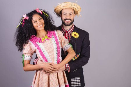 Photo for Couple wearing typical clothes of Festa Junina, Arraial, Festa de So Joo. - Royalty Free Image