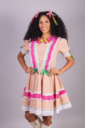 Photo for Brazilian woman wearing typical clothes of festa junina, arraial, festa de so joo. - Royalty Free Image