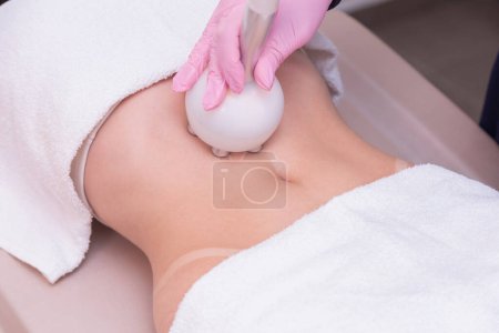 Photo for Close-up photo of a woman's belly, photo of aesthetics, procedures on the abdomen. beauty clinic. radio frequency, slimming. weight loss. - Royalty Free Image